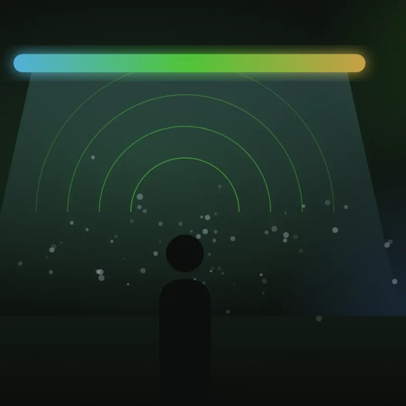 Illustration of a guest standing under coloured light with sound waves and a fine scented mist around them